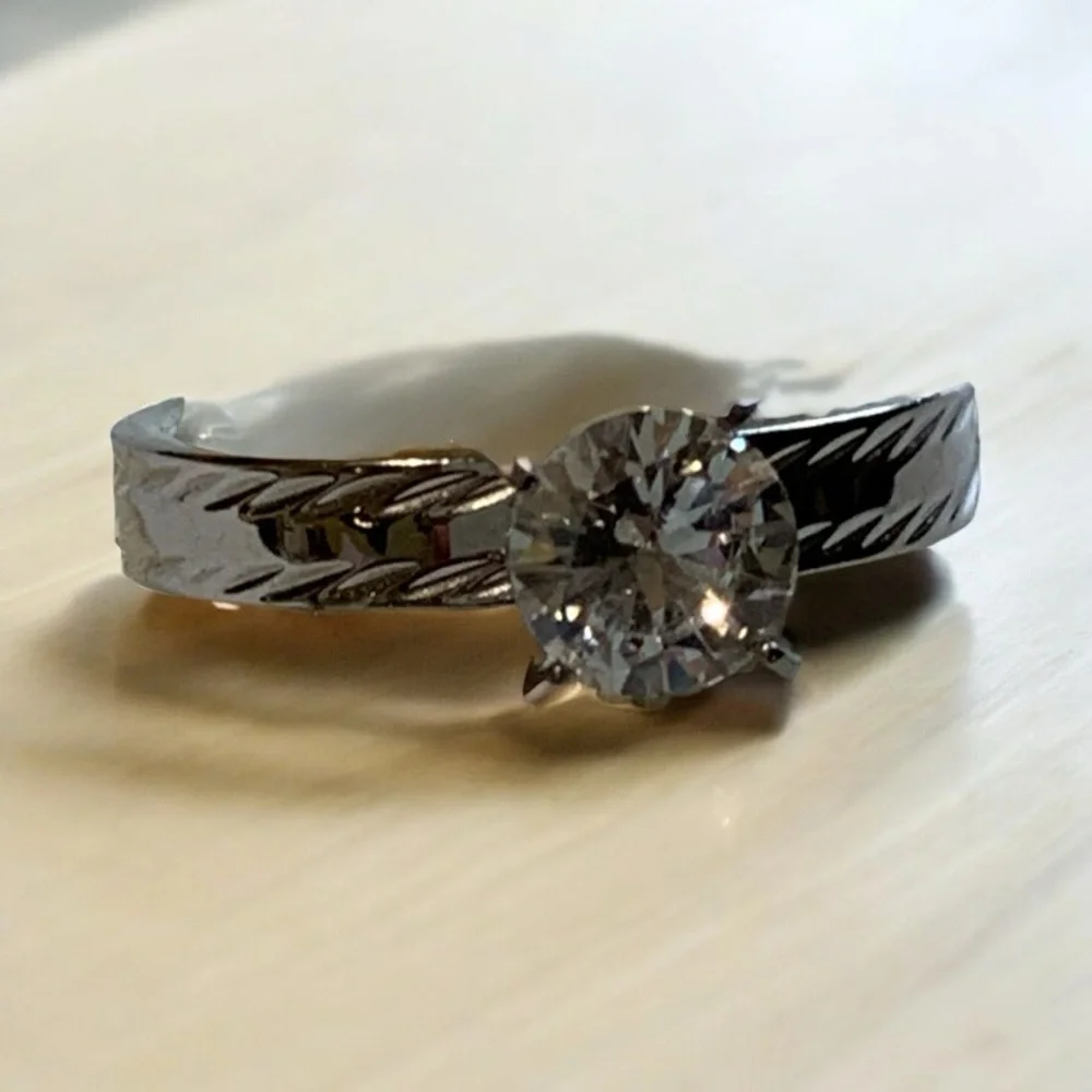 Stainless steel solitaire engagement style ring with real gemstone size 10